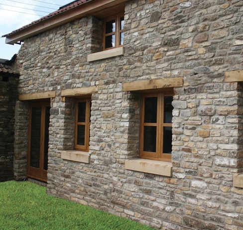 Timber windows and door in a stone barn conversion